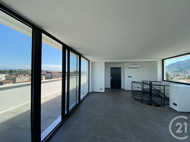 Afficher la photo en grand Appartement Duplex à vendre - 4 pièces - 113.58 m2 - GUILHERAND GRANGES - 07 - RHONE-ALPES - Century 21 Alpimmo