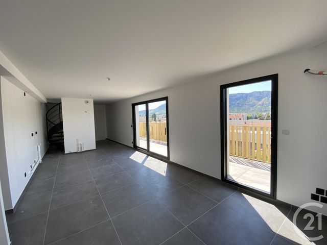 Afficher la photo en grand Appartement Duplex à vendre - 4 pièces - 113.58 m2 - GUILHERAND GRANGES - 07 - RHONE-ALPES - Century 21 Alpimmo